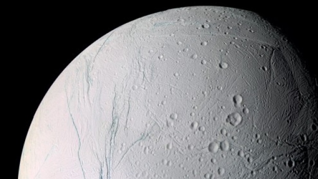 The surface of Saturn's moon Enceladus, as seen in 2007. Scientists have found food on that moon that they say could sustain potential life.