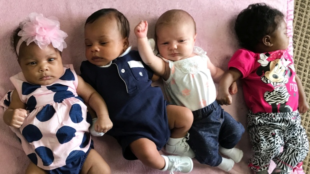 Four babies born at the same U.S. hospital earlier this year are pictured together. Many traits vary among different members of a population of humans and animals, from body size to hair colour, and those differences are often linked to differences in genes. Natural selection occurs when some of those traits help some individuals survive and reproduce more than others.