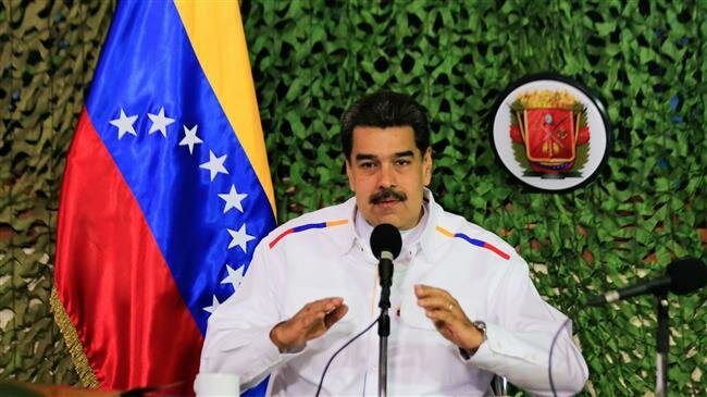 Handout picture released by the Venezuelan presidency shows Venezuelan President Nicolas Maduro speaking on the occasion of the 236th anniversary of the birth of South American Liberator Simon Bolivar and the start of military exercises under the name "Campana Libertadora Simon Bolivar 2019," in Caracas on July 24, 2019. (Photo by AFP)